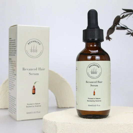 Revanced Hair Serum bottle with dropper and packaging on a light background