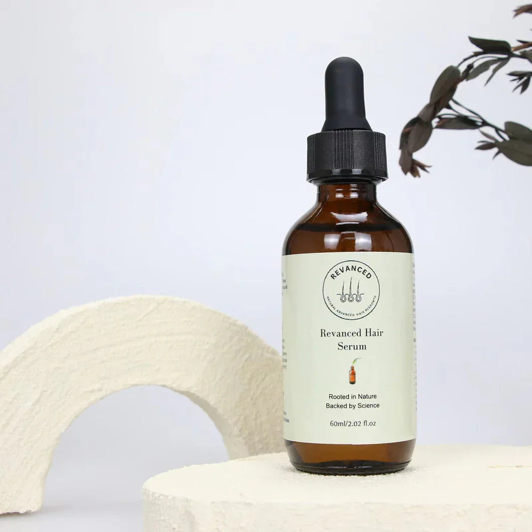 Revanced Hair Serum bottle on a neutral background