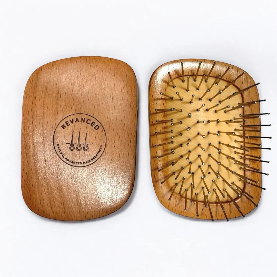 Featuring a bamboo base and premium stainless-steel bristles, this brush is designed to elevate your scalp care routine. The rounded, soft-touch stainless steel bristles glide effortlessly through hair and across the scalp, stimulating circulation without irritation. Perfect for evenly distributing the Revanced Hair Regrowth Serum while providing a gentle scalp massage.